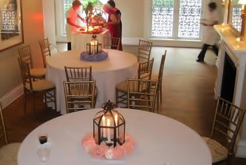 For downstairs tables we used our black lanterns in the center of flower 